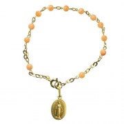 dizainier-en-corail-et-plaque-or